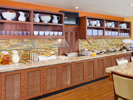 Complimentary hot breakfast buffet with eggs, bacon, fruit at Hyatt House LAX